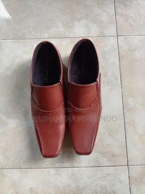 Brand new brown color pair of shoes
