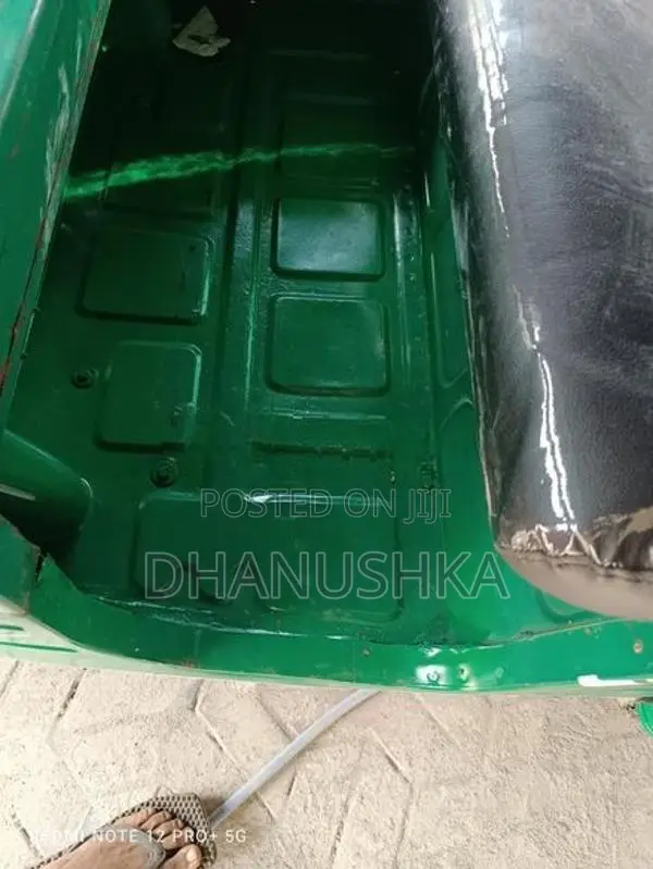 Bajaj RE 2014