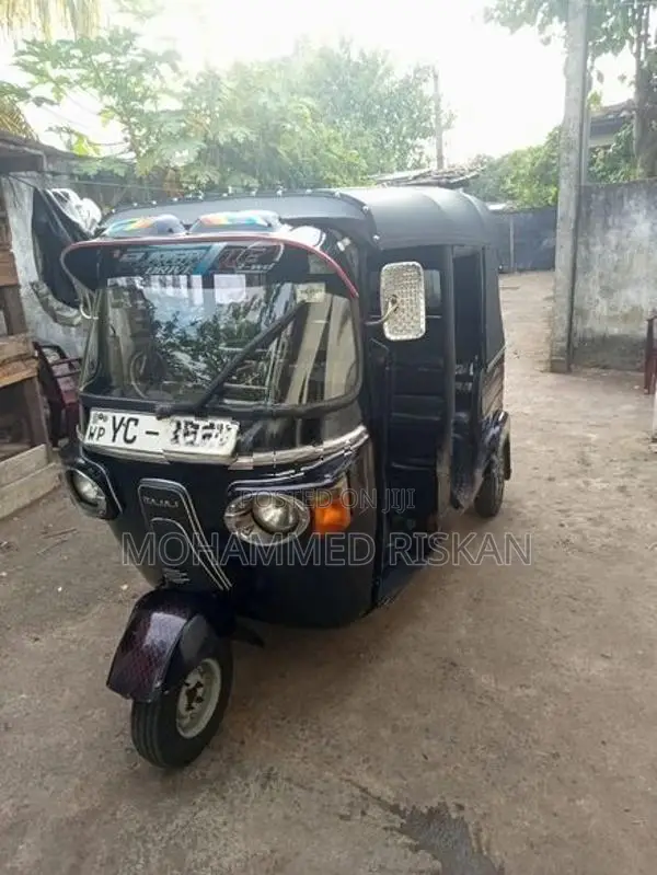 Bajaj RE 2011