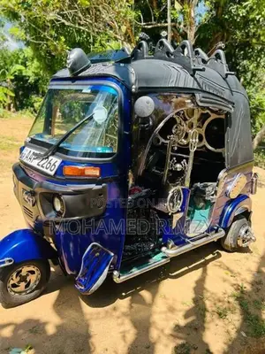 Bajaj RE 2014