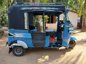 Bajaj RE 2014