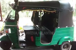 Bajaj RE AAK 2013