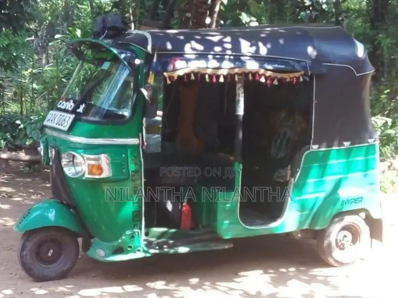 Bajaj RE AAK 2013