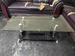 This dark brown 3-seater PVC sofa