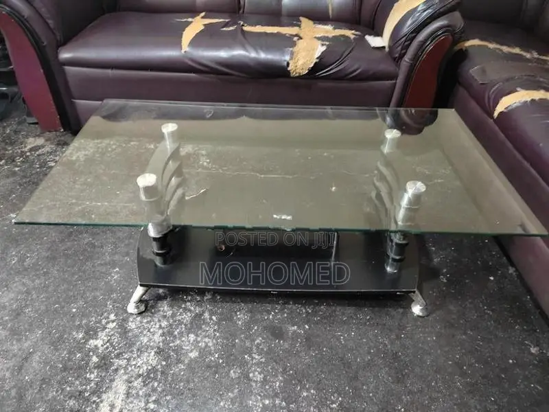 This dark brown 3-seater PVC sofa