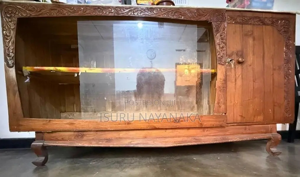 Elegant Carved Wooden Display Cabinet with Glass Sliding Doors