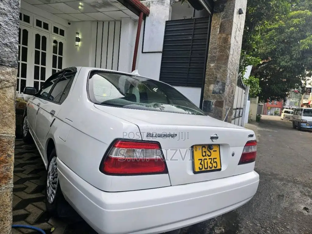 Nissan QU 14 2000 Car (Used)