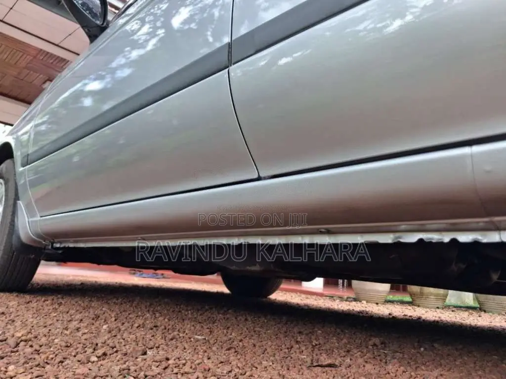Nissan FB15 EX Saloon 2000 Car (Used)