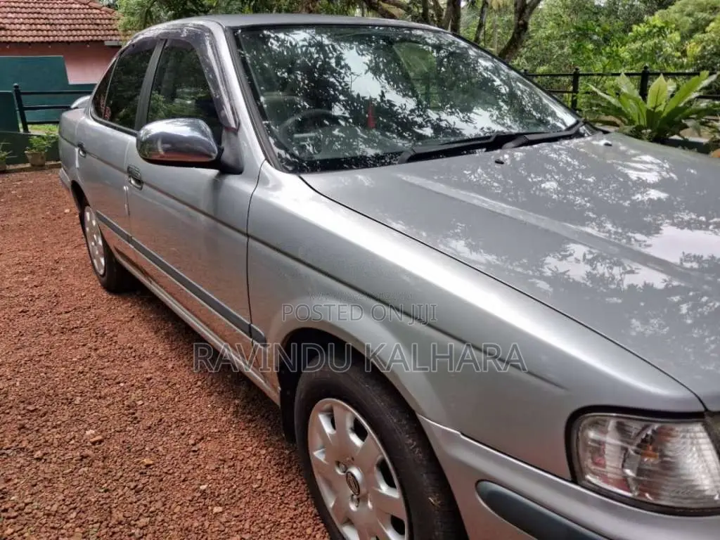 Nissan FB15 EX Saloon 2000 Car (Used)