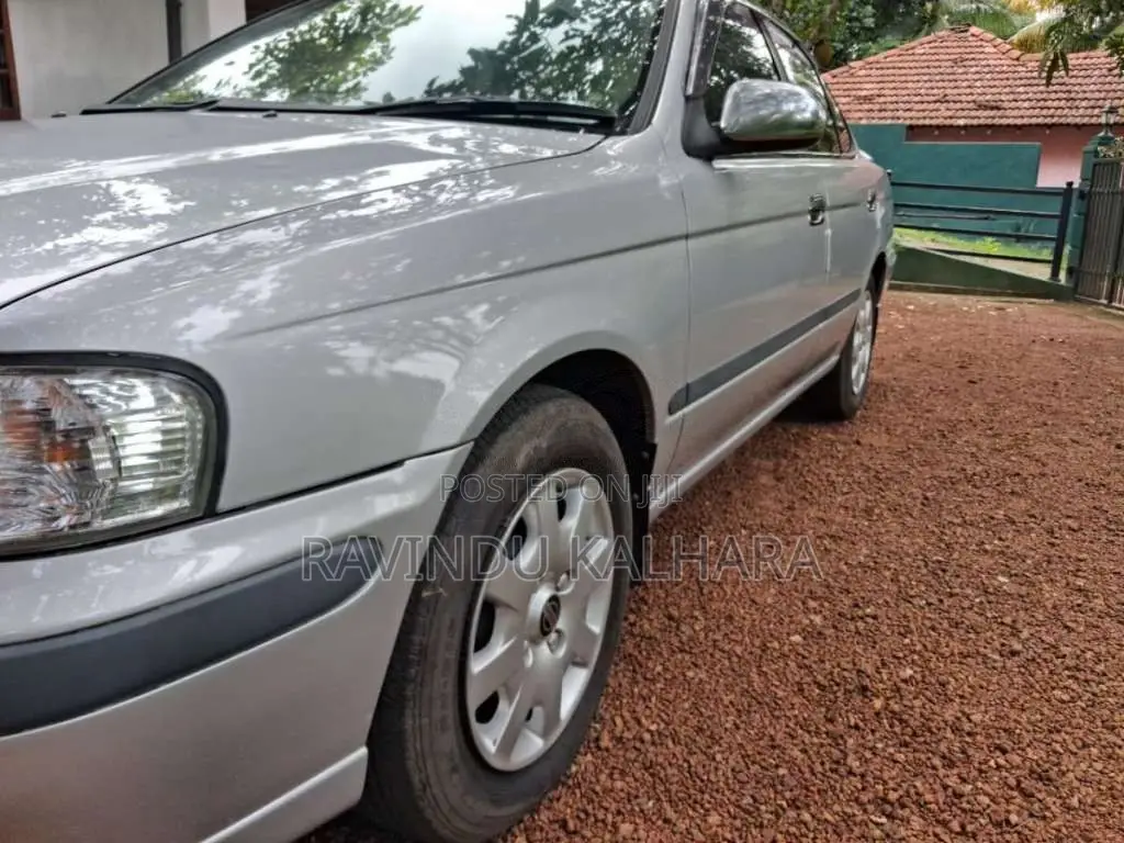 Nissan FB15 EX Saloon 2000 Car (Used)