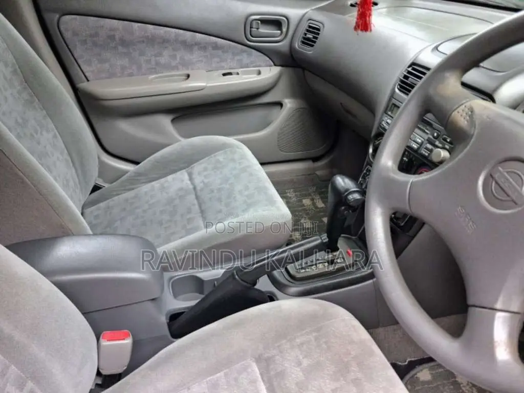 Nissan FB15 EX Saloon 2000 Car (Used)