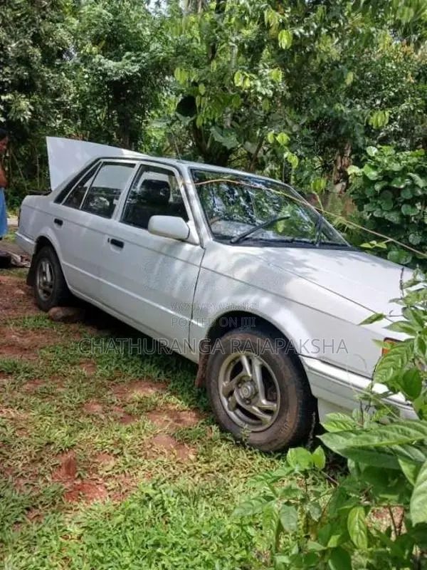Mazda Familia 1988 Car (Used)
