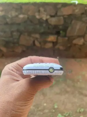 Liam Button Phone (Used)