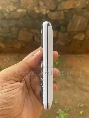 Liam Button Phone (Used)