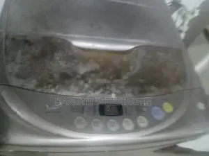 LG FULL AUTO TOP LODING W/MACHINE