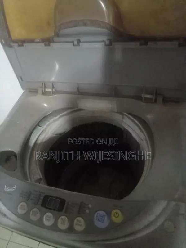 LG FULL AUTO TOP LODING W/MACHINE