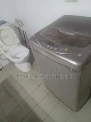 LG FULL AUTO TOP LODING W/MACHINE