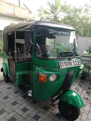 Bajaj RE 2013