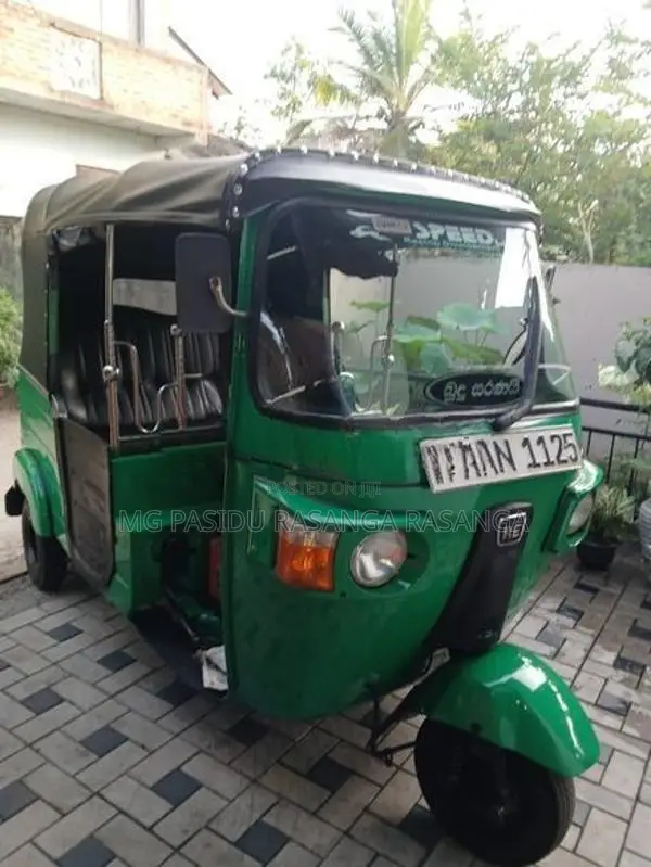 Bajaj RE 2013