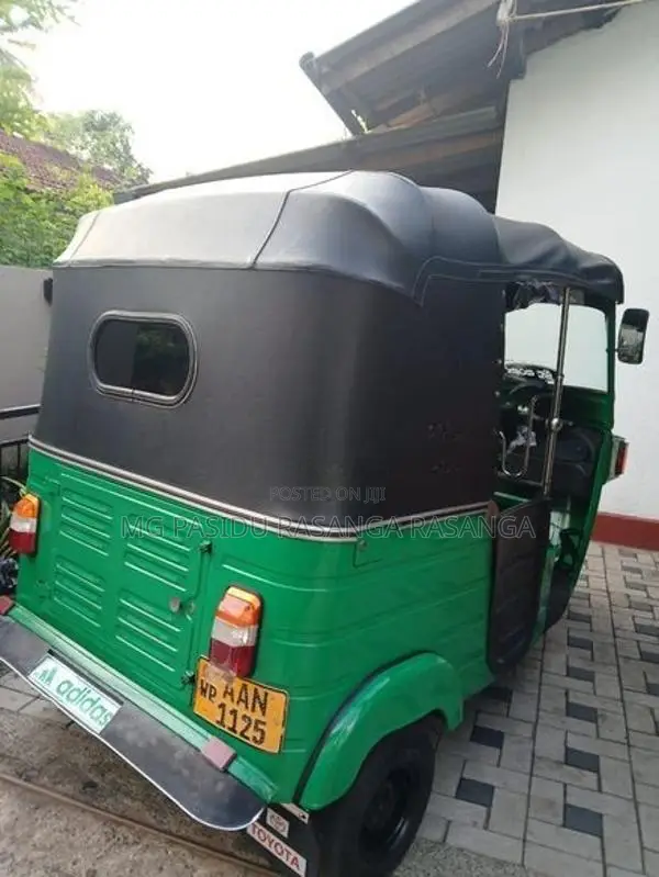 Bajaj RE 2013