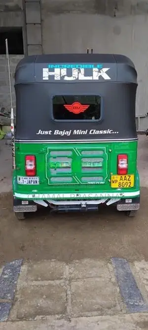 Bajaj RE 2014