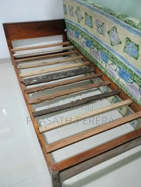 One Used Wooden Bed