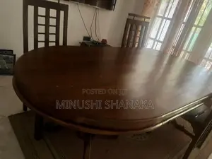 Teak dining table