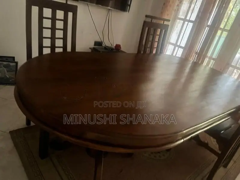 Teak dining table