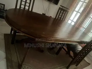 Teak dining table