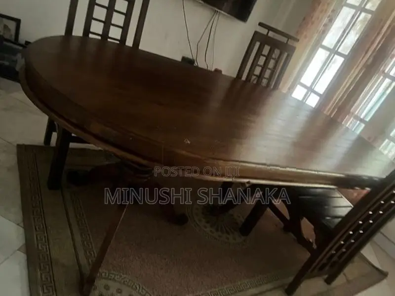Teak dining table