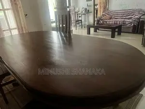 Teak dining table