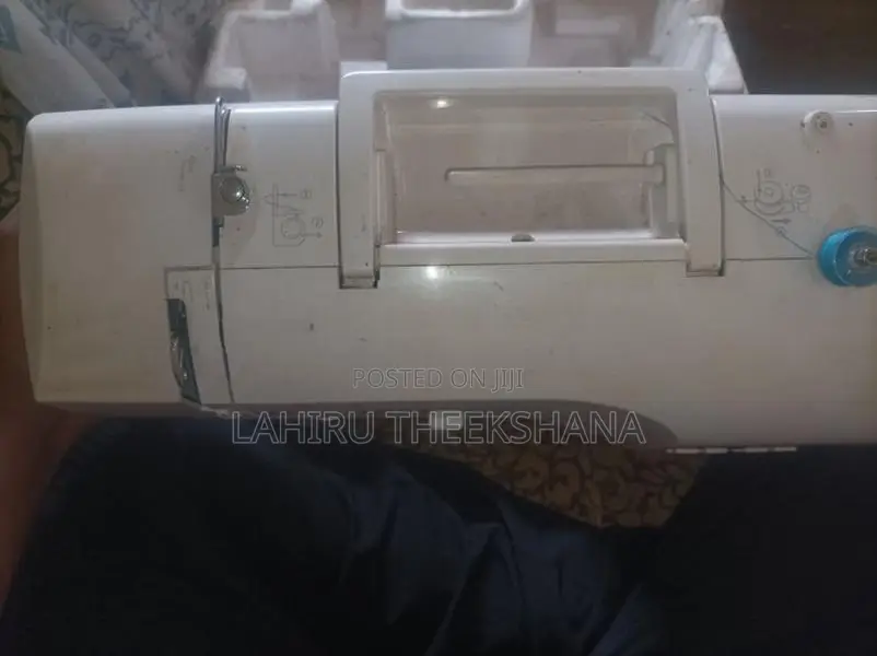 Singer SC220 Portable Sewing Machine