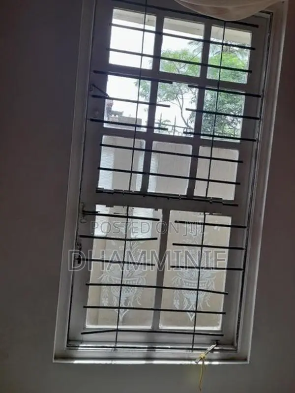 Wooden Window with Grill