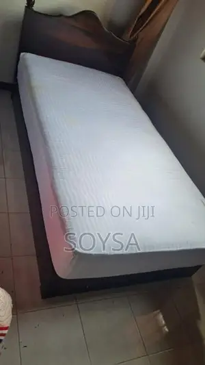 Single bed with 8" thick mattress