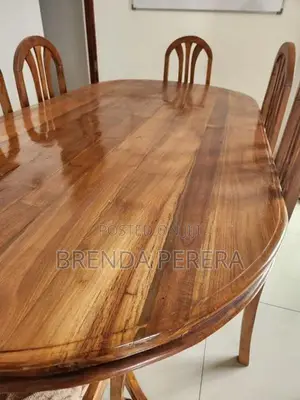Six Chair Teak Dining Table