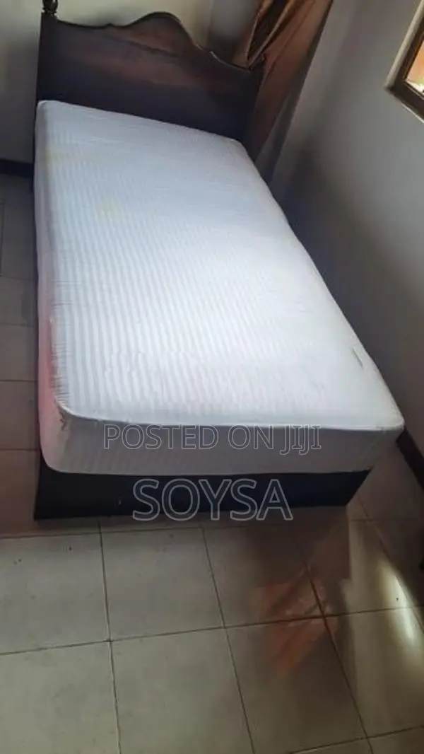 Single bed with 8" thick mattress