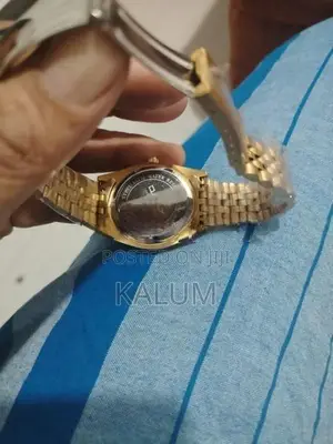 Omax Gold Color Watch