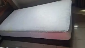 Single bed with 8" thick mattress