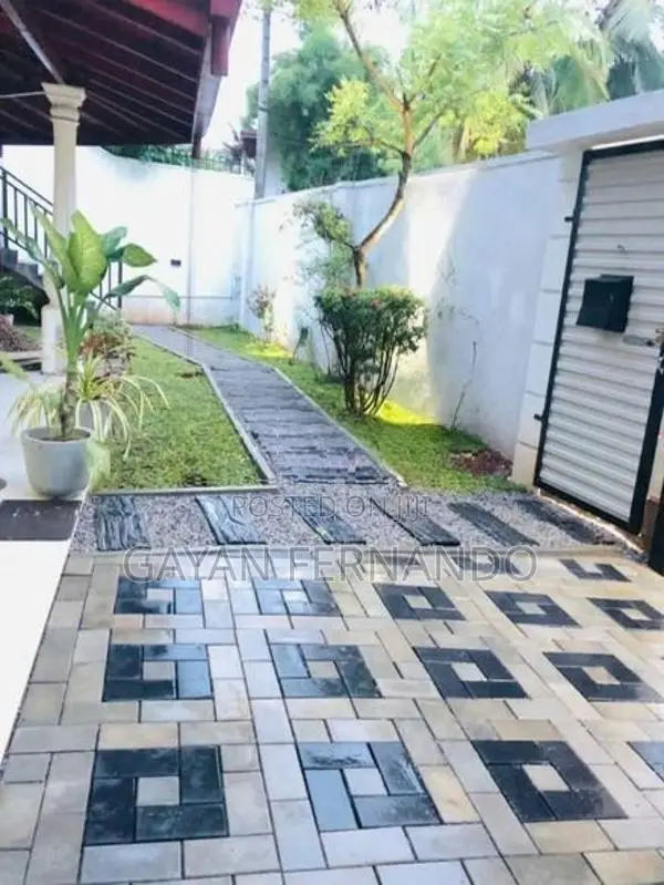 malaysian grass with interlock paving