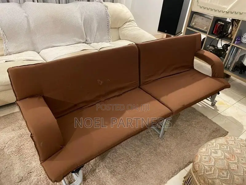 Folding sofa bed