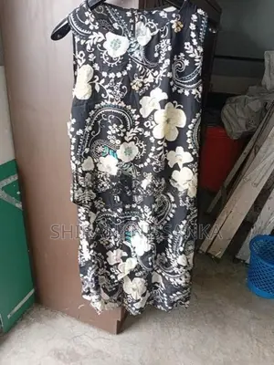 SLEEVELESS LONG BLOUSE