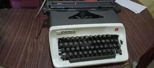 Antique Olympia Typewriter
