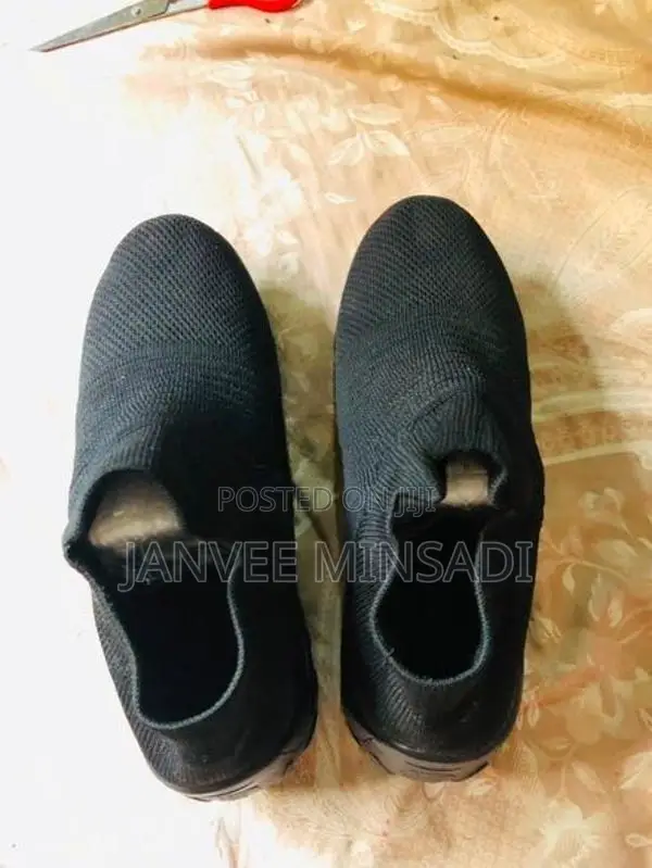 Black Air Cushion Slip-On Sneakers