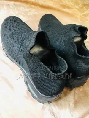 Black Air Cushion Slip-On Sneakers