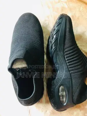 Black Air Cushion Slip-On Sneakers