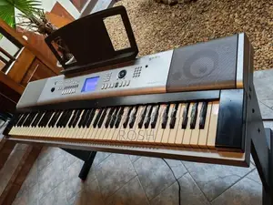 Yamaha -Portable Grand Piano DGX 520