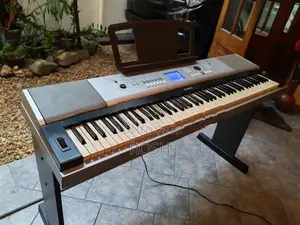 Yamaha -Portable Grand Piano DGX 520