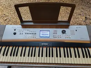 Yamaha -Portable Grand Piano DGX 520