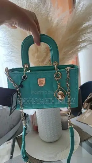 LYN M Structured Top Handbag in Mint Green