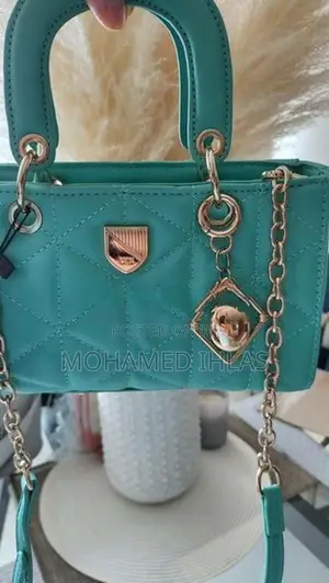 LYN M Structured Top Handbag in Mint Green